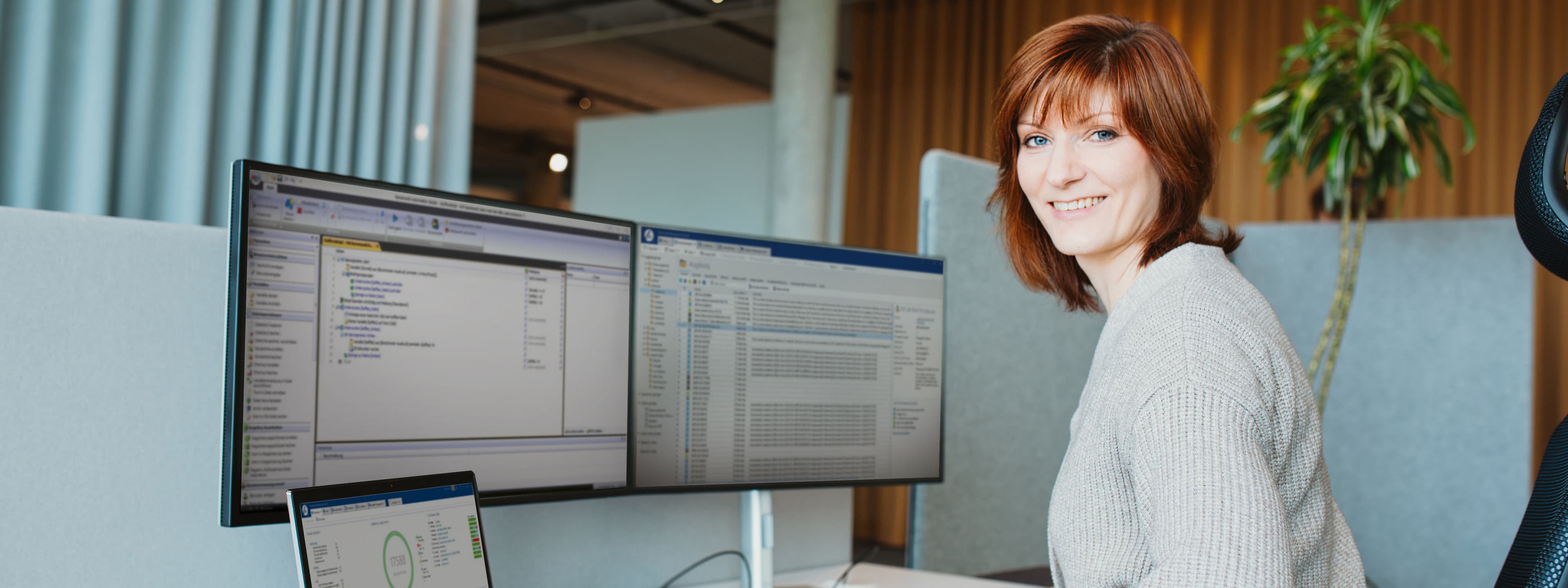 baramundi-Management-Suite-it-admin-working-at-dual-monitor-setup
