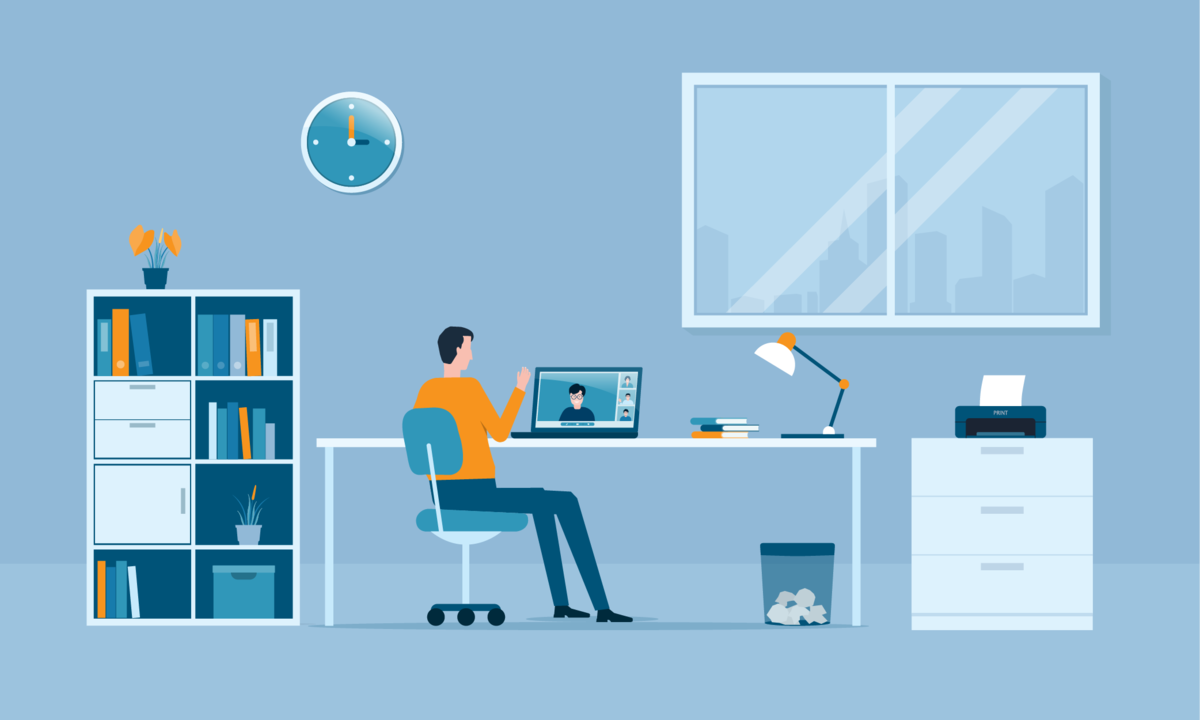 Eine Person, die in einem Homeoffice-Setup an einem Schreibtisch sitzt und an einer Videokonferenz teilnimmt