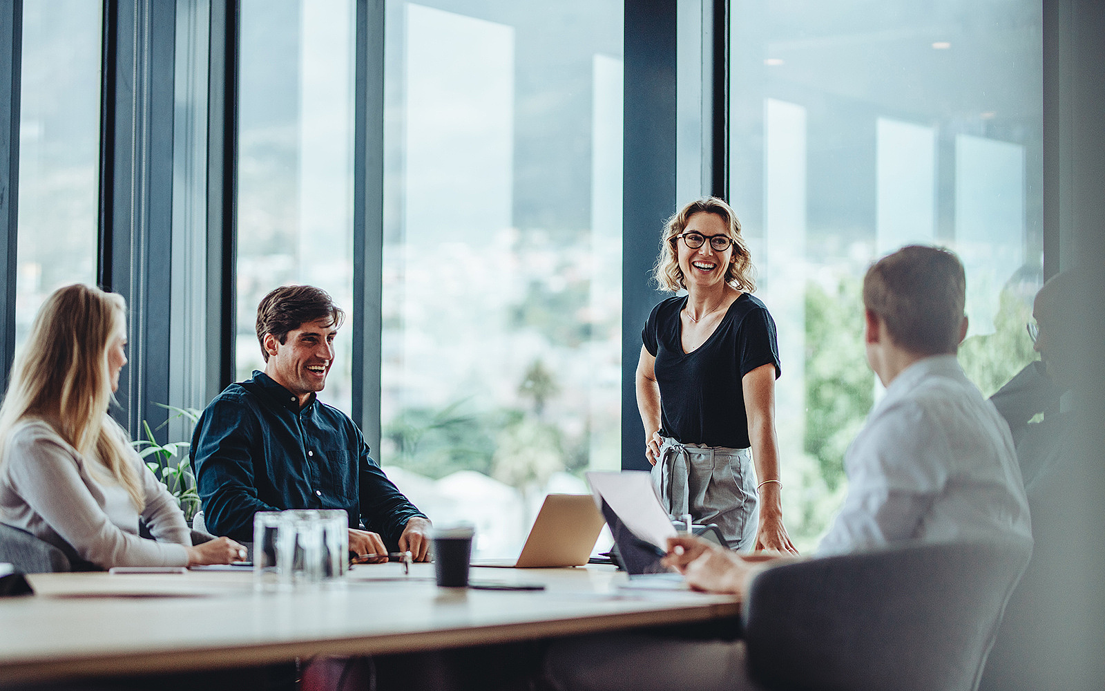 Business people having casual discussion during meeting