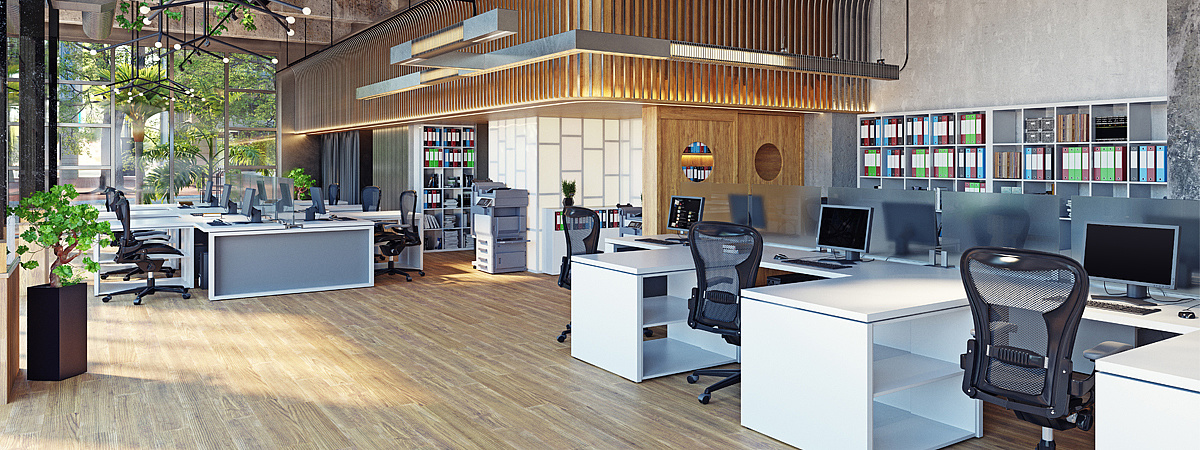 Modernes, helles Büro mit Arbeitsstationen und Computern